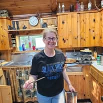 Smiling faces in the camp kitchen